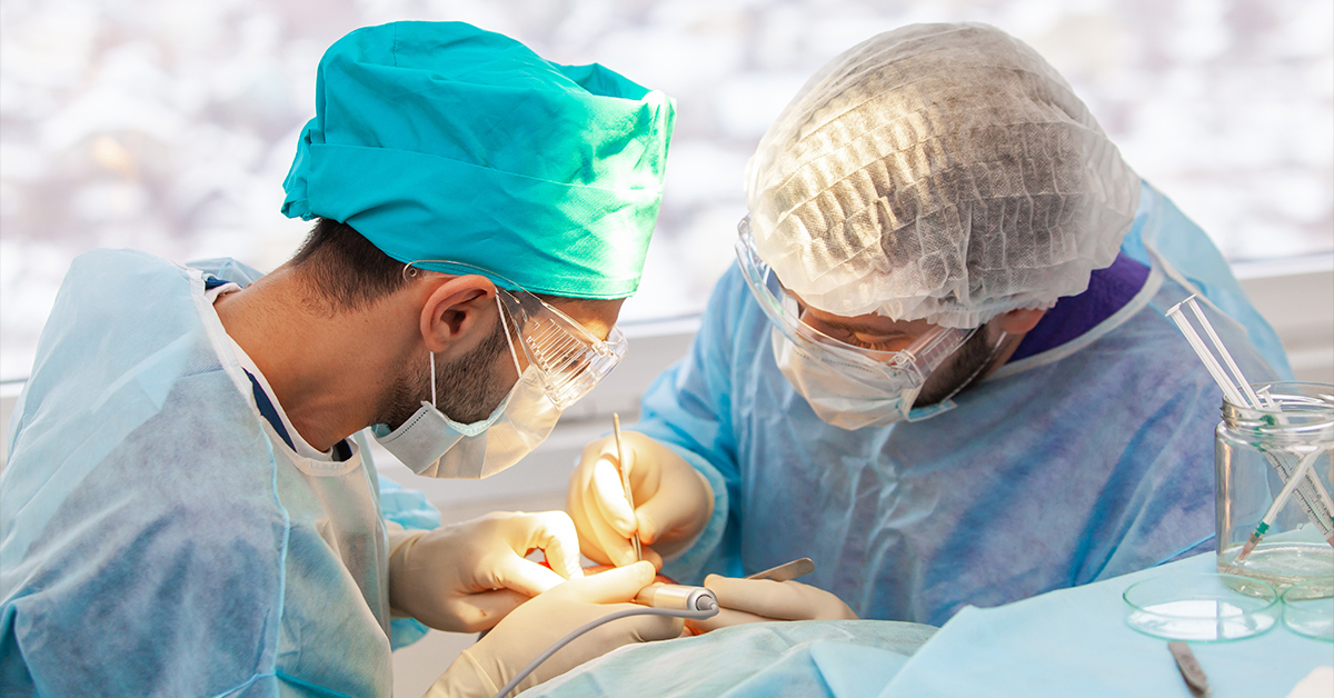 Doctor and technician performing procedure